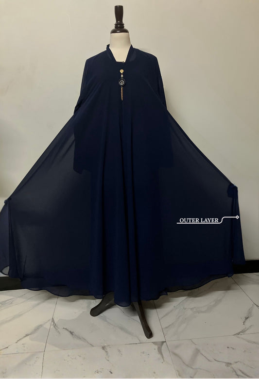 Detailed view of the wide-flare chiffon outer layer on the Sapphire Kaftan, perfect for formal modest wear.