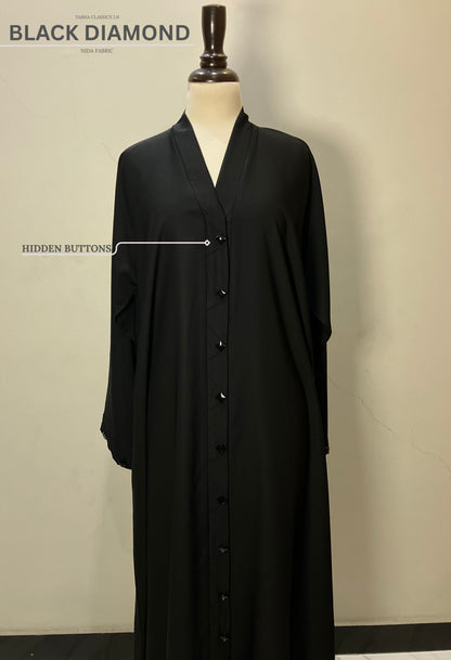 Front view of the Black Diamond abaya in Nida fabric highlighting the sleek hidden button closure.