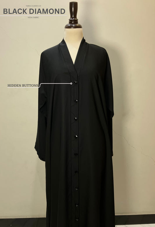 Front view of the Black Diamond abaya in Nida fabric highlighting the sleek hidden button closure.