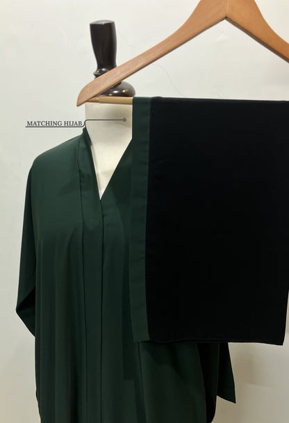 Emerald green abaya set shown with a free matching hijab featuring green border detailing – Tarha.pk.