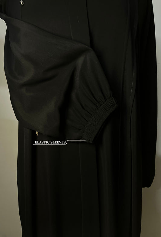 Wudu-friendly elastic sleeves on the Midnight black abaya, designed for comfort and daily wear by Tarha.pk.