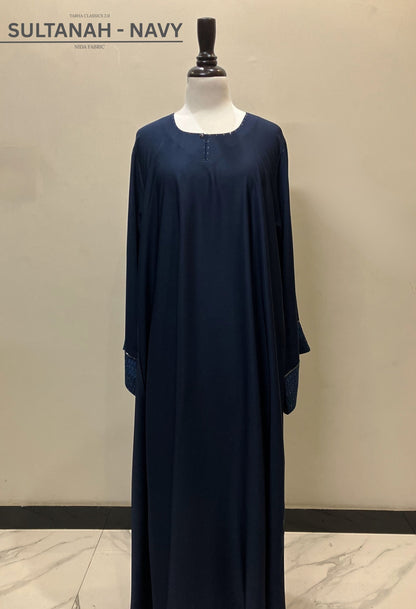 Sultanah navy blue closed abaya in premium Nida fabric featuring a clean front and sophisticated silhouette – Tarha.pk Classics V2.
